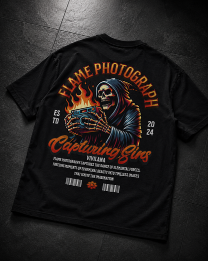 Black graphic tee with grim reaper holding camera, 'Flame Photograph' and 'Capturing Sins' text, edgy streetwear design